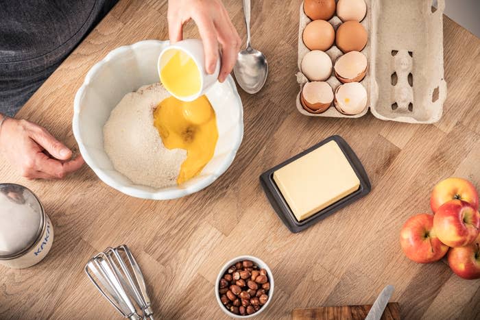 adding eggs to a cake batter