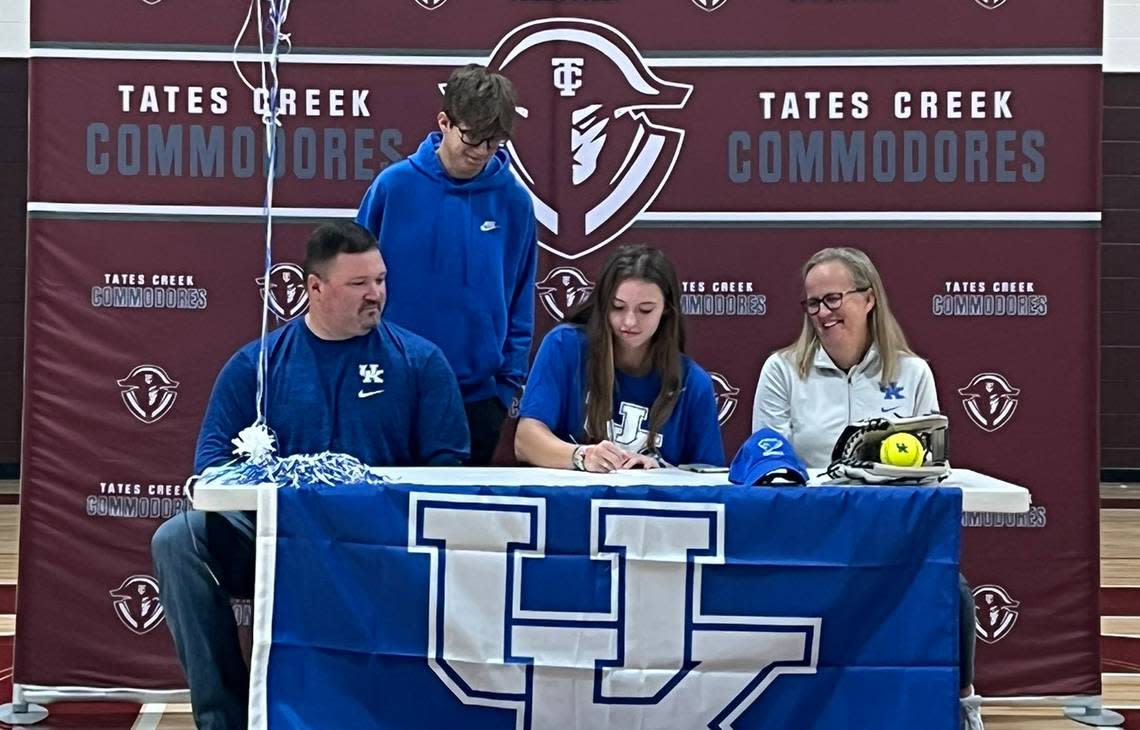 Tates Creek softball’s Peyton Plotts signs her letter of intent to continue her playing career at the University of Kentucky in a signing day ceremony at Tates Creek High School on Wednesday, Nov. 9, 2022.
