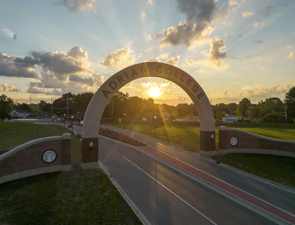 Adrian College's archway is pictured overlooking Adrian College Boulevard with the roadway leading to the college's campus.