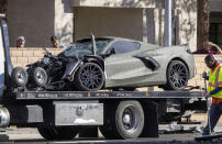 FILE - A Chevrolet Corvette owned by Las Vegas Raiders wide receiver Henry Ruggs III is shown on a flatbed truck after a fatal crash on South Rainbow Boulevard between Tropicana Avenue and Flamingo Road in Las Vegas Tuesday, Nov. 2, 2021. Ruggs will admit driving drunk at speeds up to 156 mph and causing a fiery crash that killed a woman, in a plea deal that is expected to send the one-time football star to state prison for at least three years. (Steve Marcus/Las Vegas Sun via AP,File)