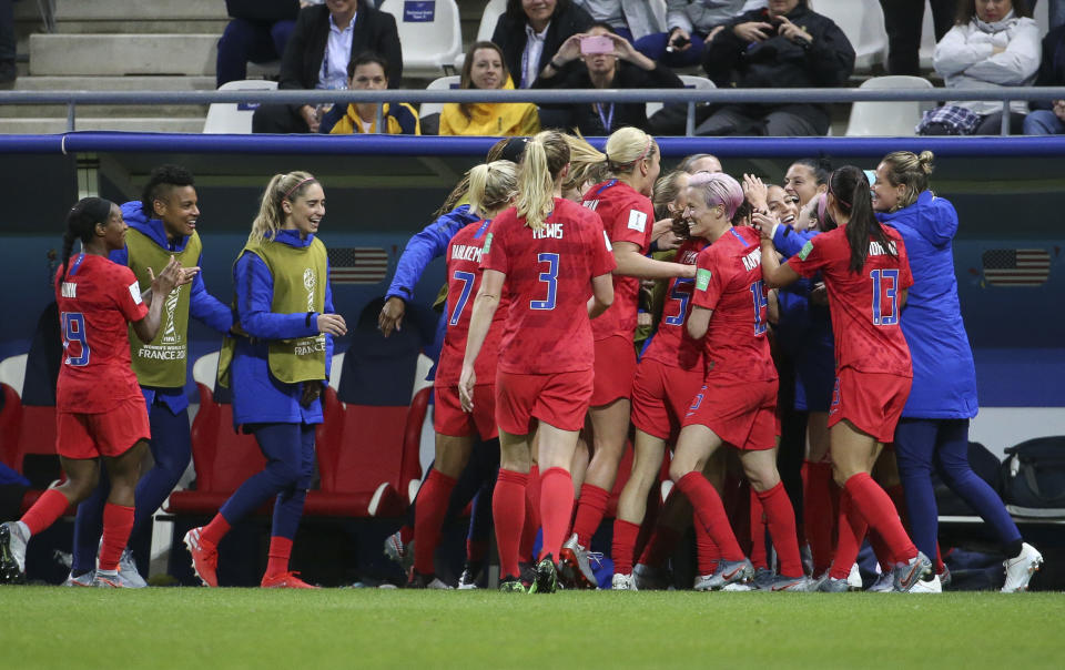 REIMS, FRANCE - JUNE 11: Megan Rapinoe of USA and teammates celebrate a goal during the 2019 FIFA Women's World Cup France group F match between USA and Thailand at Stade Auguste Delaune on June 11, 2019 in Reims, France. (Photo by Jean Catuffe/Getty Images)