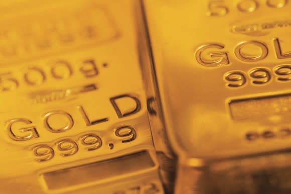 Two gold bars lying side by side.