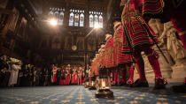 Yeoman Warders conduct the traditional ceremonial search in the Palace of Westminster during the start of the state opening of parliament in London, Thursday Dec. 19, 2019. Queen Elizabeth II will formally open a new session of Britain’s Parliament, with a speech giving the first concrete details of what Prime Minister Boris Johnson plans to do with his commanding new majority. (Richard Pohle, Pool via AP)