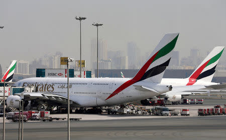 FILE PHOTO: Emirates Airlines aircraft are seen at Dubai International Airport, United Arab Emirates May 10, 2016. REUTERS/Ashraf Mohammad/File Photo