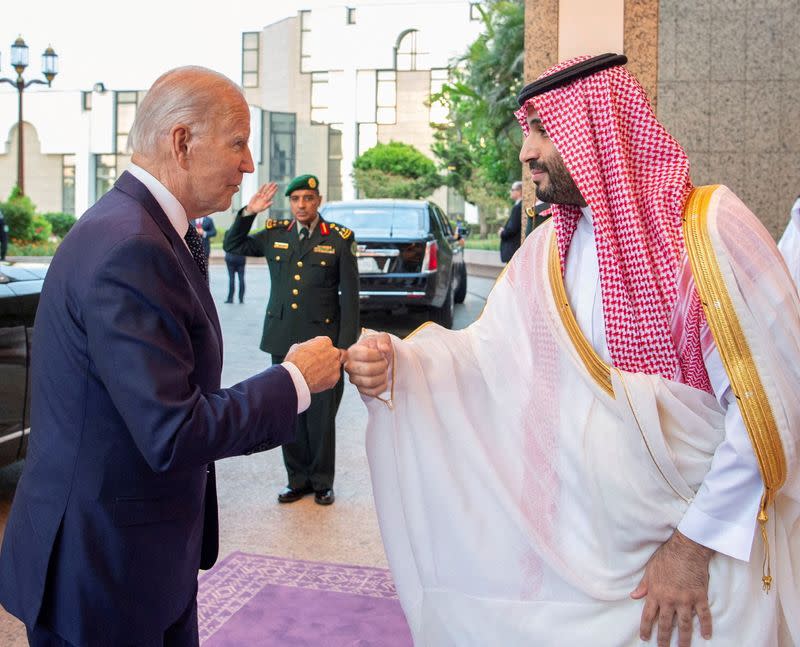 FILE PHOTO: Saudi Crown Prince Mohammed bin Salman fist bumps U.S. President Joe Biden upon his arrival at Al Salman Palace, in Jeddah
