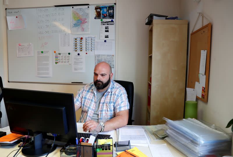 Wetter, 38-year-old, works as a dispatcher at a garbage disposal dump during the global coronavirus disease (COVID-19) outbreak, in Erd