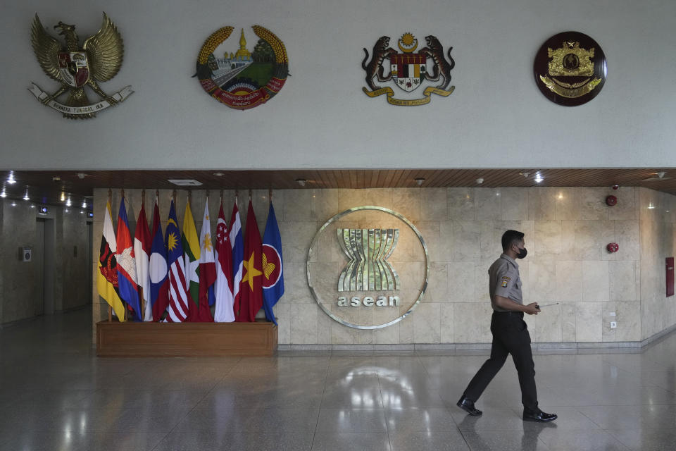 A security walks inside ASEAN building in Jakarta, Indonesia, Friday, Feb. 3, 2023. Southeast Asian foreign ministers are meeting in Indonesia's capital Friday for talks bound to be dominated by the deteriorating situation in Myanmar despite an agenda focused on food and energy security and cooperation in finance and health. (AP Photo/Achmad Ibrahim)