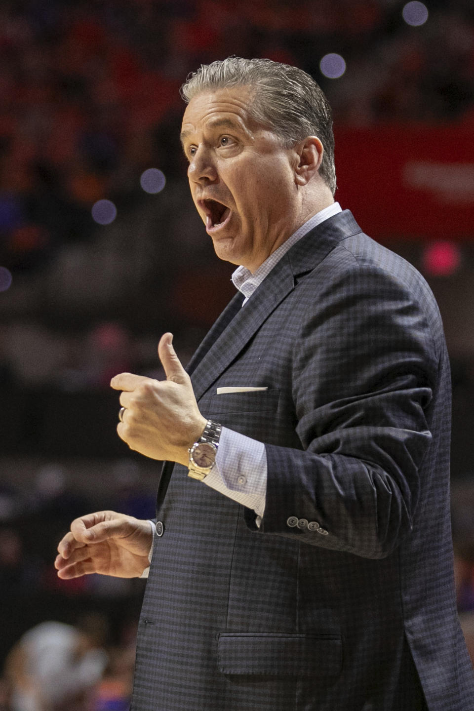 Kentucky Wildcats head coach John Calipari yells from the sideline during the first half of an NCAA college basketball game against Florida Saturday, Jan. 6, 2024, in Gainesville, Fla. (AP Photo/Alan Youngblood)