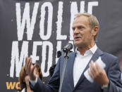 Donald Tusk, the leader of the Polish opposition party Civic Platform, speaks to a crowd of protesters in defense of media freedom in Warsaw, Poland, on Tuesday, Aug. 10, 2021. Poles demonstrated nationwide Tuesday against a bill widely viewed as a effort by the country's nationalist ruling party to silence an independent, U.S.-owned television broadcaster that is critical of the government.(AP Photo/Czarek Sokolowski)