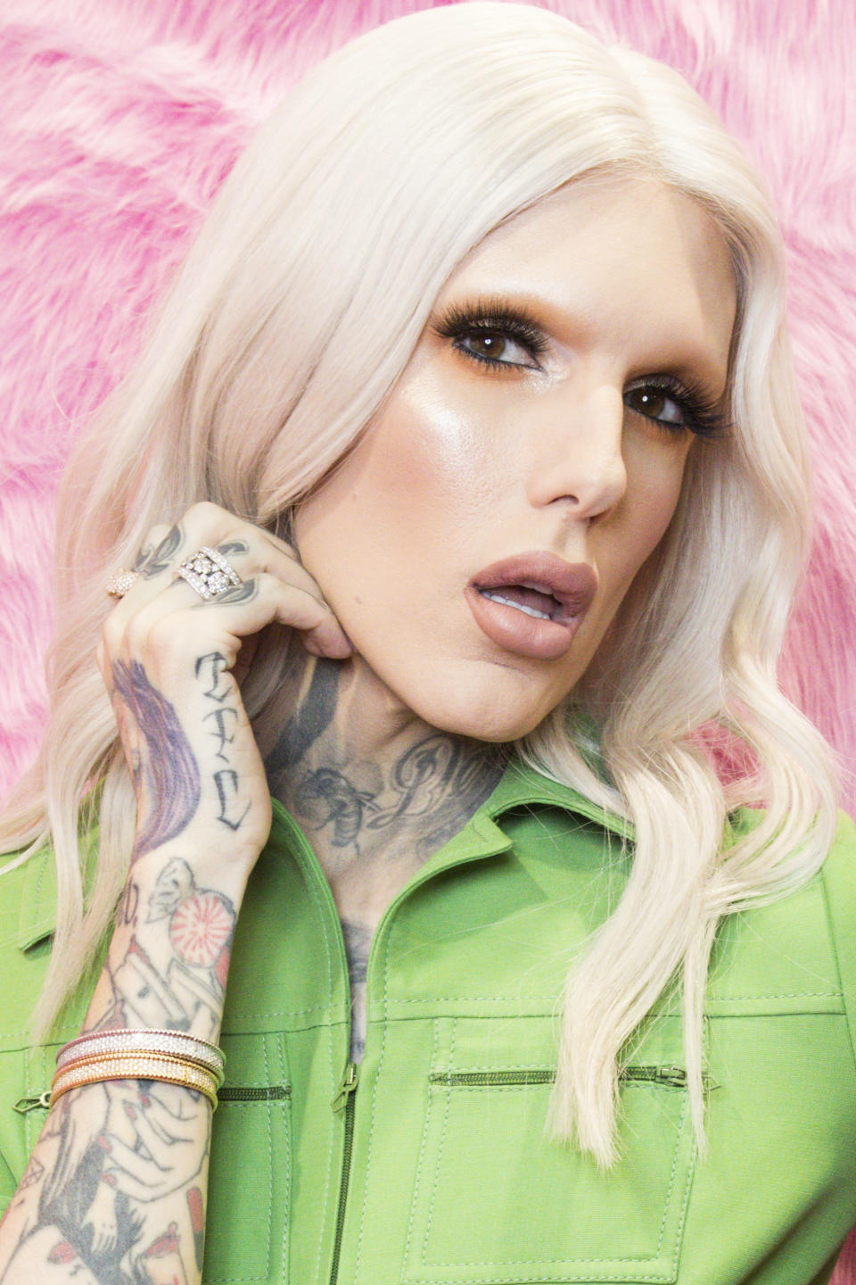 Jeffree Star posing on a red carpet