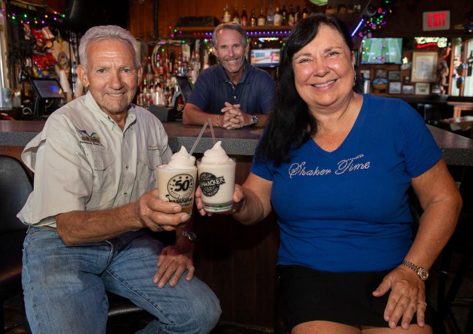 Sandshaker owners Sonny, Beverly, and their son Joe, middle, are celebrating the bar's 50th anniversary. The Pensacola Beach bar is well known for its signature frozen Bushwacker rum drink.