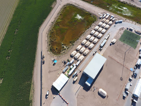 A tent city set up to hold immigrant children separated from their parents or who crossed the U.S. border on their own, is seen inTornillo, Texas, U.S., in this U.S. Department of Health and Human Services (HHS) image released on October 12, 2018. Courtesy HHS/Handout via REUTERS/Files