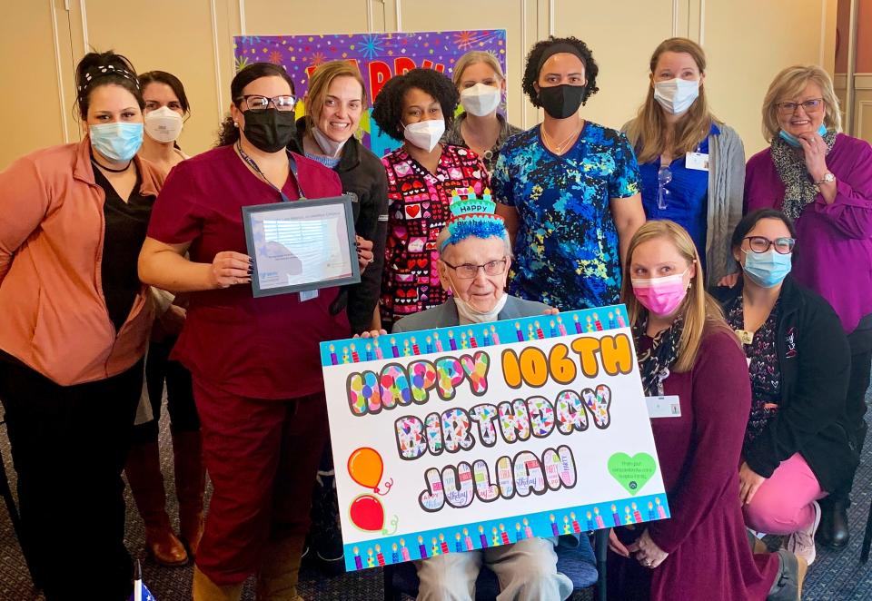 Julian Ziomek, a longtime Taunton resident, Army veteran and current resident at All American Assisted Living in Raymham, celebrated his 106th birthday on Wednesday, Feb. 2. Here, Julian is seen with nursing home staff.  