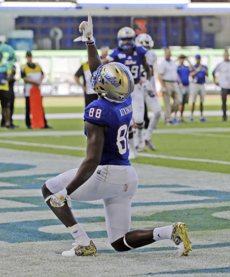 Tulsa wide receiver Josh Atkinson (88) celebrates after scoring a touchdown against Central Michigan in the first half of the Miami Beach Bowl NCAA college football game, Monday, Dec. 19, 2016, in Miami. (AP Photo/Alan Diaz)