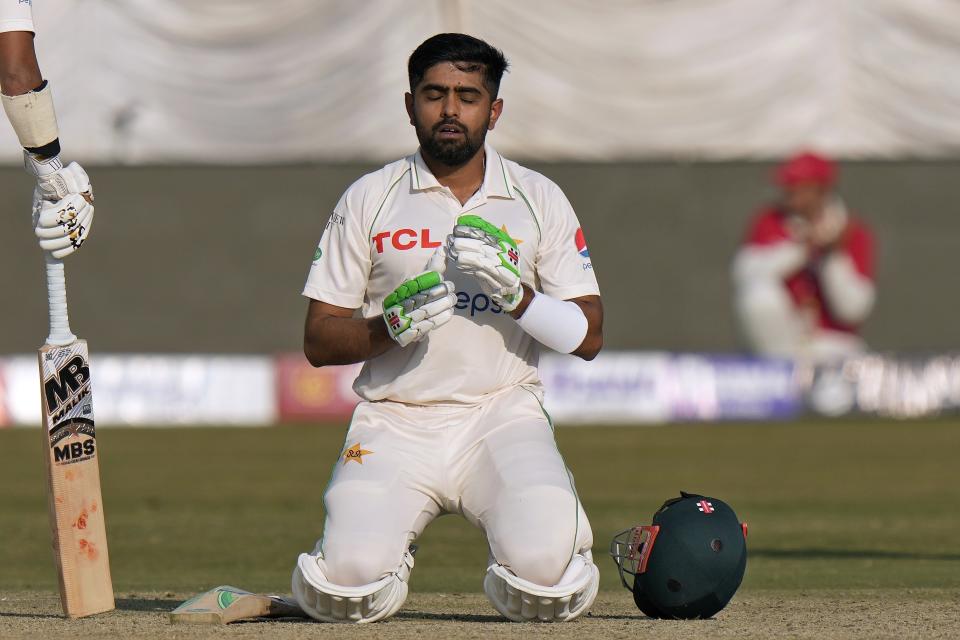 Pakistan's Babar Azam celebrates after scoring century during the third day of the first test cricket match between Pakistan and England, in Rawalpindi, Pakistan, Saturday, Dec. 3, 2022. (AP Photo/Anjum Naveed)