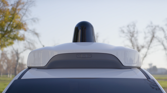 The top of a self-driving car equipped with sensors.