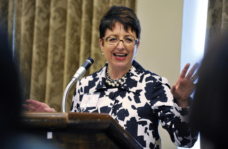 FILE - Carol Tome, then the CFO of Home Depot and now CEO of United Parcel Service, speaks at the Commerce Club in Atlanta on April 21, 2010. Tome was among the top five highest paid women CEOs in 2023 according to a survey by the Associated Press. (AP Photo/Atlanta Journal-Constitution, Bita Honarvar, File)