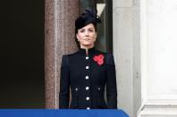 <p>At the annual <a href="https://www.townandcountrymag.com/society/tradition/g34610029/queen-elizabeth-royal-family-remembrance-sunday/" rel="nofollow noopener" target="_blank" data-ylk="slk:Remembrance Sunday ceremony;elm:context_link;itc:0;sec:content-canvas" class="link ">Remembrance Sunday ceremony</a>, the Duchess of Cambridge wore an all-black outfit, keeping with tradition. Her detailed coat was a custom Alexander McQueen and the hat from famed milliner Philip Treacy. </p>