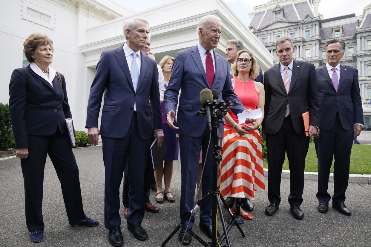 Joe Biden with a bipartisan group of senators