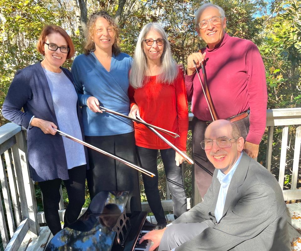 Members of the Pernambuco Chamber Ensemble, named for the wood from which the group's bows ae fashioned.