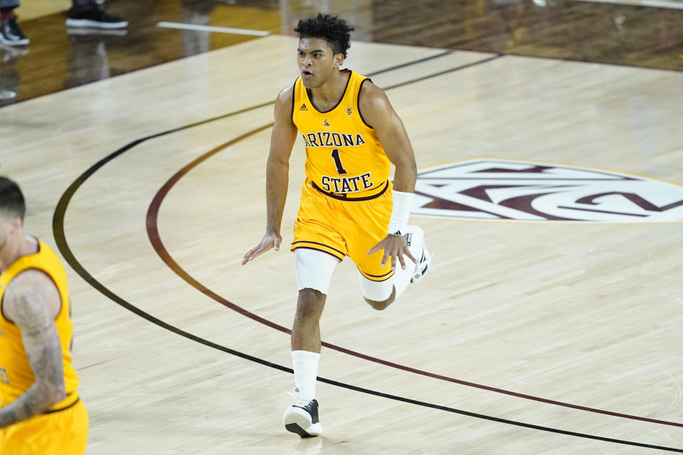 Arizona State guard Remy Martin (1) celebrates a basket against Oregon State during the first half of an NCAA college basketball game, Sunday, Feb. 14, 2021, in Tempe, Ariz.(AP Photo/Matt York)
