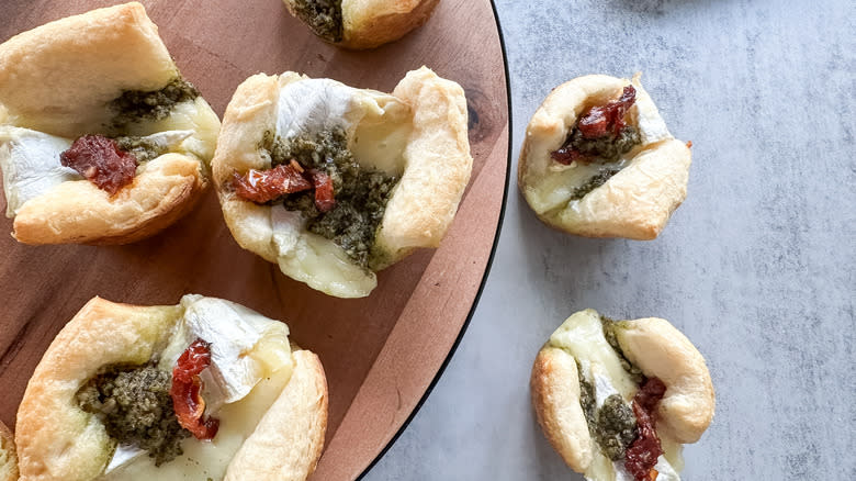 pesto brie bites on platter