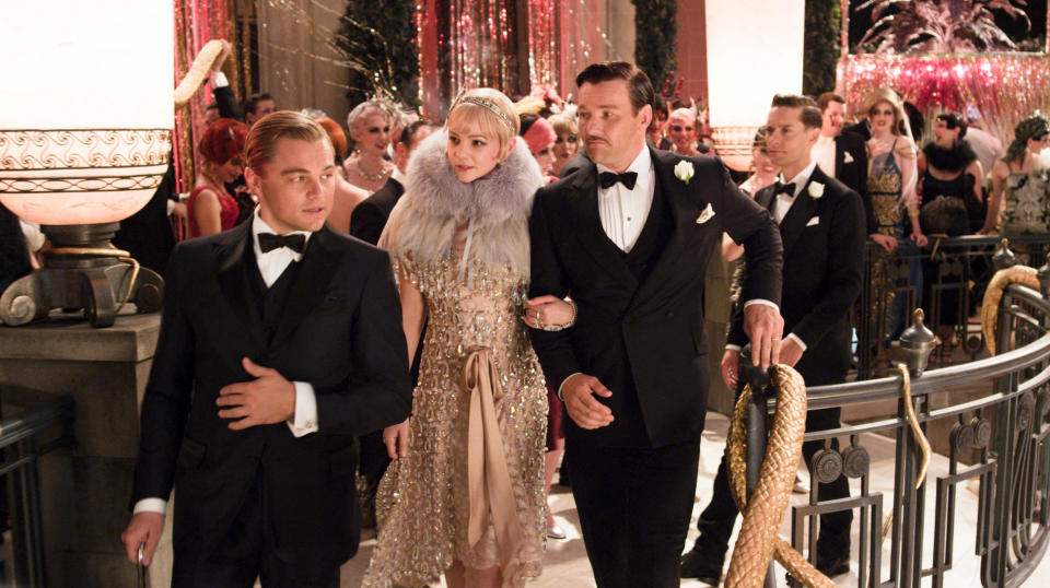 THE GREAT GATSBY, from left: Leonardo Di Caprio as Jay Gatsby, Carey Mulligan, Joel Edgerton, Tobey Maguire, 2013. ©Warner Bros./courtesy Everett Collection