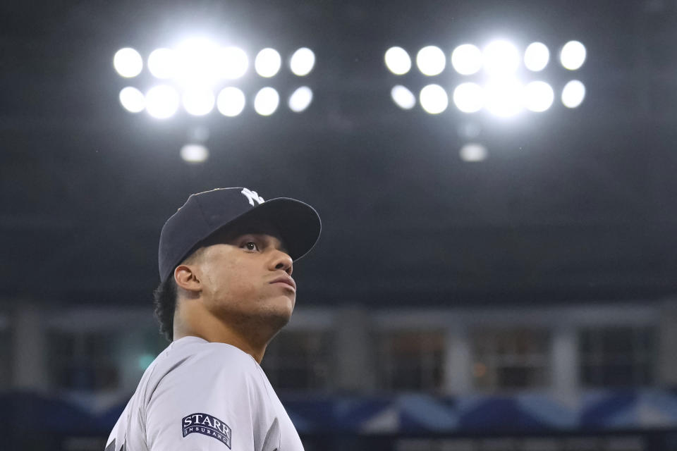 New York Yankees Juan Soto looks into the crowd as he heads back to the dugout at the end of eighth inning of the team's baseball game against the Toronto Blue Jays on Friday, June 28, 2024, in Toronto. (Chris Young/The Canadian Press via AP)