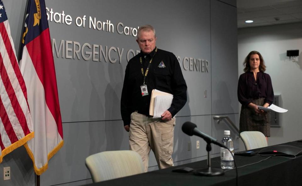 Mike Sprayberry, North Carolina Director of Emergency Management, and Dr. Elizabeth Cuervo Tilson, North Carolina State Health Director, Chief Medical Officer, arrive for a press briefing to update the public on the COVID-19 virus on Tuesday, March 24, 2020 at the Emergency Operations Center in Raleigh, N.C.