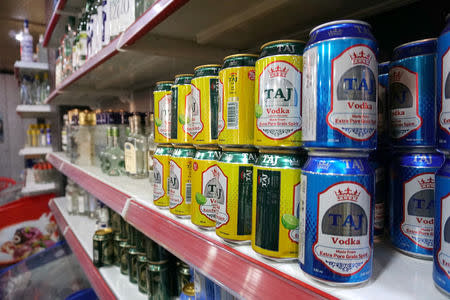 Liquor cans are seen inside a reopen shop, after it was banned during the Islamic State militants' seizure of the city, in Mosul, Iraq April 23, 2019. REUTERS/Abdullah Rashid