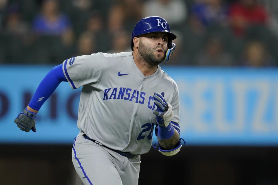 Kansas City Royals' Emmanuel Rivera sprints around first on his way to a bases-clearing triple I the ninth inning of a baseball game against the Texas Rangers, Wednesday, May 11, 2022, in Arlington, Texas. Salvador Perez, Nicky Lopez and Whit Merrifield scored on the hit. (AP Photo/Tony Gutierrez)