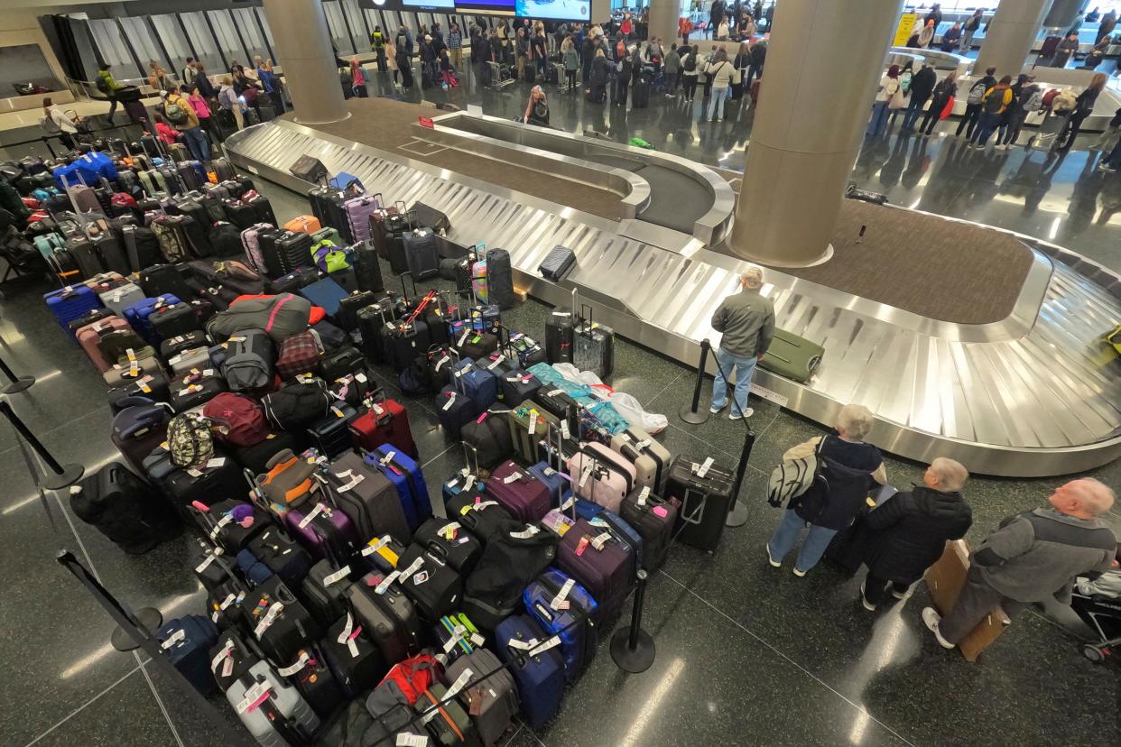 Baggage waits to be claimed at the Southwest Airlines baggage claim Tuesday, Dec. 27, 2022, at Salt Lake City International Airport, in Salt Lake City.