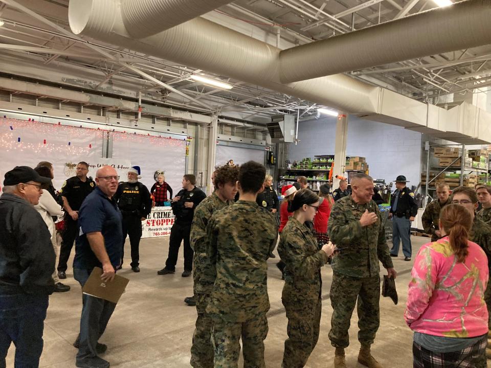 Member of the Muncie Central High School JROTC Participate in the Heroes and Helpers Event at Walmart South Saturday.