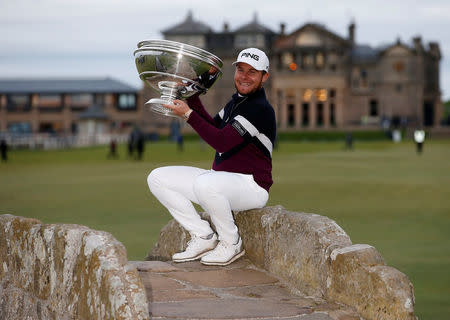 England's Tyrrell Hatton celebrates winning the Alfred Dunhill Links Championship with the trophy Action Images via Reuters/Craig Brough