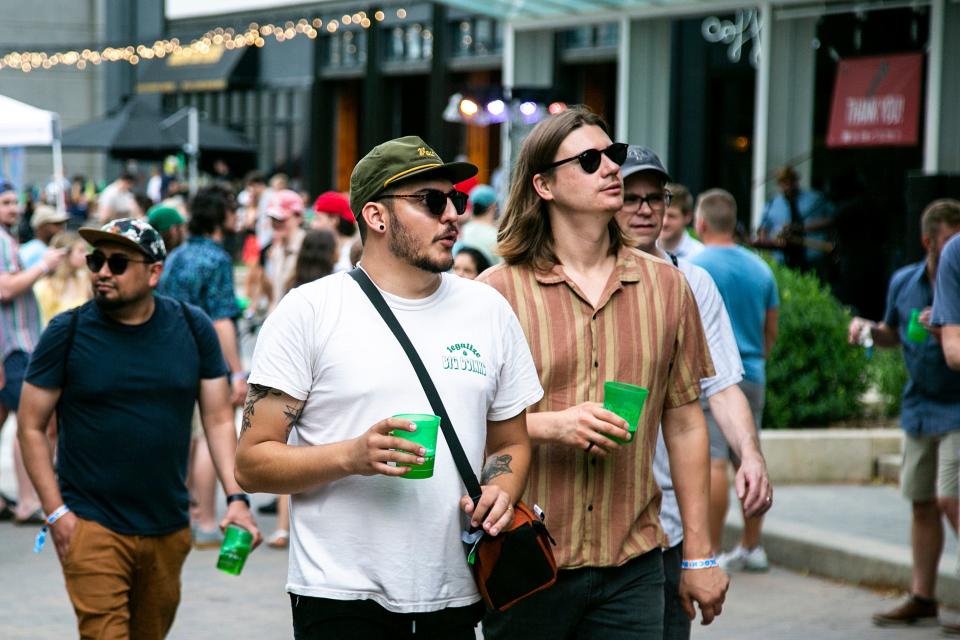 Thousands of people enjoy the fifth Downtown Block Party, Saturday, June 25, 2022, in Iowa City, Iowa.