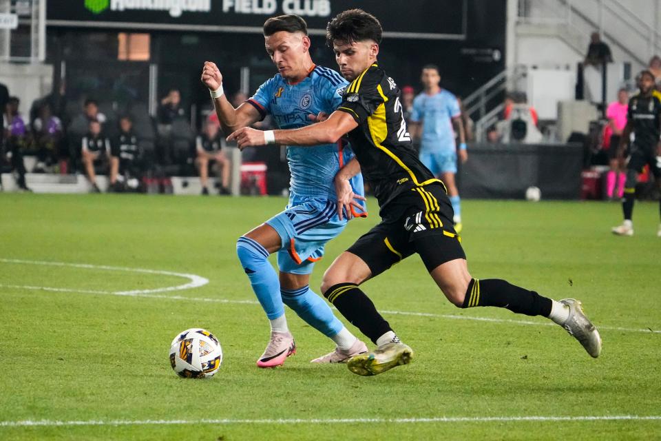 Crew forward Max Arftsen (right) fights for the ball against New York City FC forward Hannes Wolff on Aug. 31.