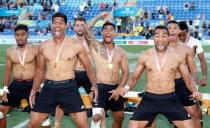 Rugby Sevens - Gold Coast 2018 Commonwealth Games - Men's Medal Ceremony - Robina Stadium - Gold Coast, Australia - April 15, 2018. Gold medalists team New Zealand perform the haka. REUTERS/Paul Childs