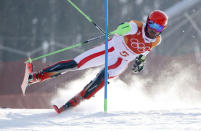 Marcel Hirscher of Austria crashes in the men's slalom. REUTERS/Dominic Ebenbichler