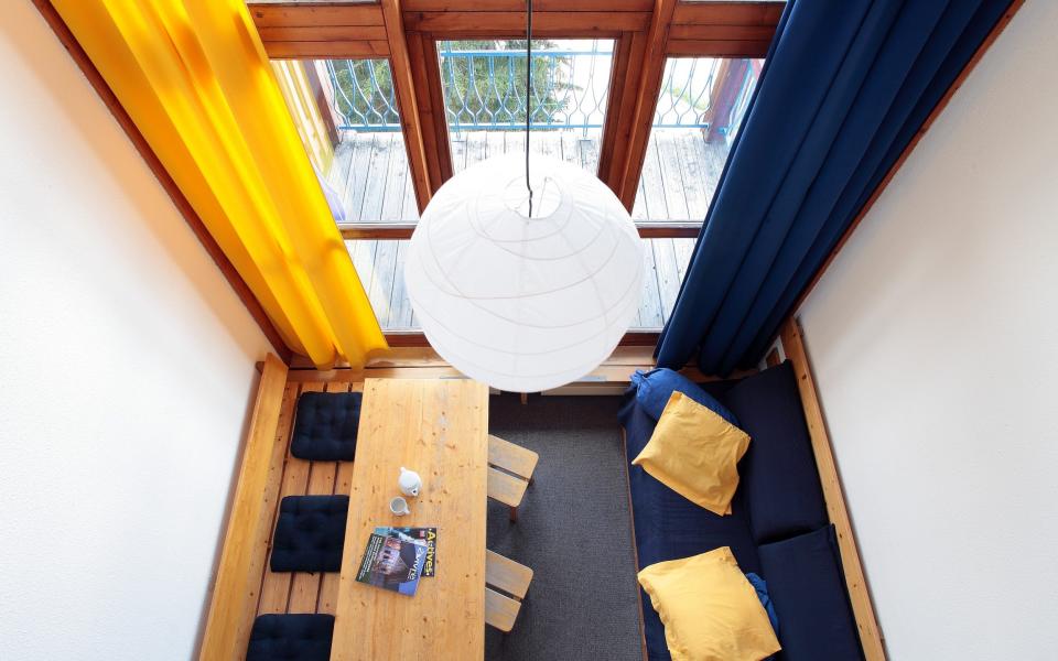 lounge area from above with globe light fixture - Nicolas Joly 2008