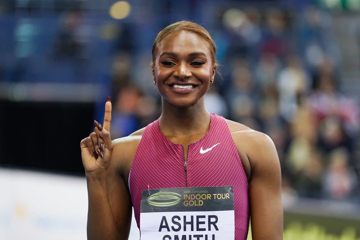 Dina Asher-Smith celebrates winning the women’s 60m (Martin Rickett/PA). (PA Wire)