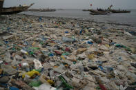 FILE - Trash and plastics litter the sand of Yarakh Beach in Dakar, Senegal, Nov. 8, 2022. More than 2,000 experts plan to wrap up early negotiations Friday, Dec. 2, on plastic pollution at one of the largest global gatherings ever to address the crisis. (AP Photo/Leo Correa, File)