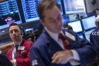 Traders work on the floor of the New York Stock Exchange December 9, 2013. REUTERS/Brendan McDermid