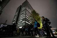 Members of the media gather in front of the building of the Tokyo District Public Prosecutors Office in Tokyo, Japan November 19, 2018. REUTERS/Toru Hanai