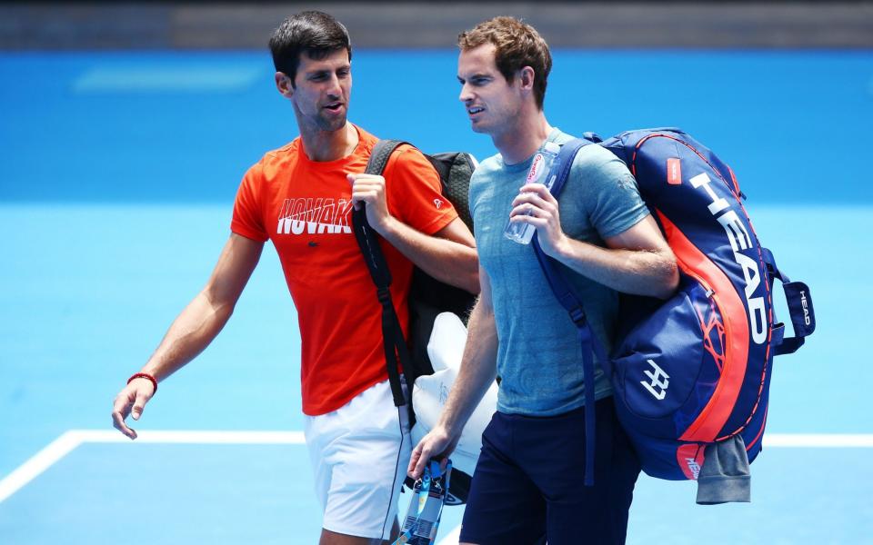 Novak Djokovic talks with Andy Murray before their practice match ahead of the 2019 Australian Open - Michael Dodge/Getty Images