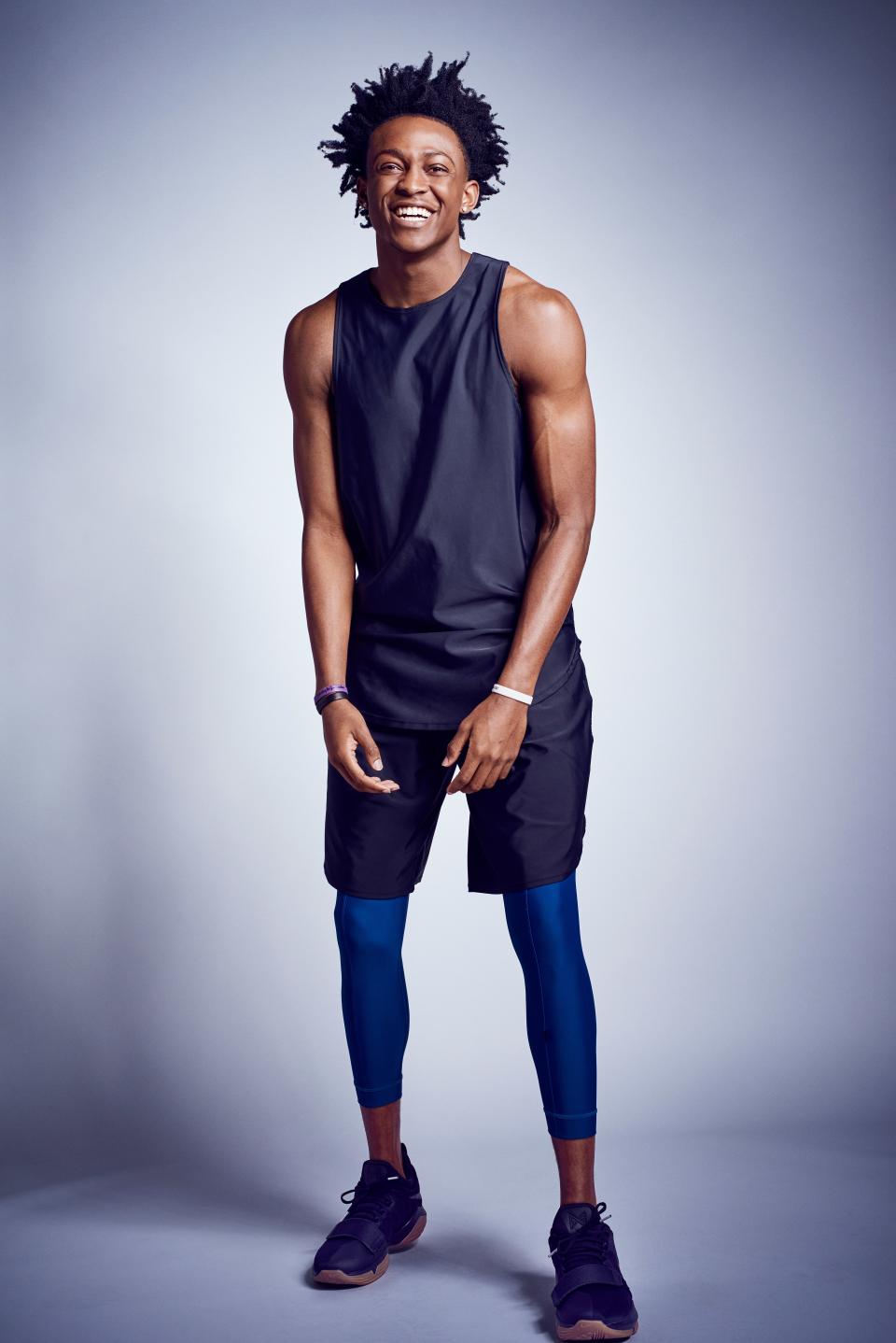 Tank top, $92, shorts, $108, and tights, $124, by STLR. Sneakers, $110, by Nike.
