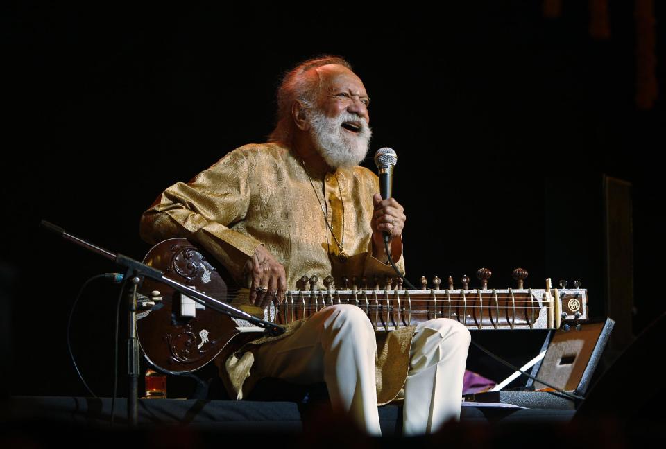 FILE - In this Feb. 7, 2012 file photo, Indian musician Ravi Shankar laughs as he speaks during a concert in Bangalore, India. Shankar, the sitar virtuoso who became a hippie musical icon of the 1960s after hobnobbing with the Beatles and who introduced traditional Indian ragas to Western audiences over an eight-decade career, has died. He was 92. (AP Photo/Aijaz Rahi, File)