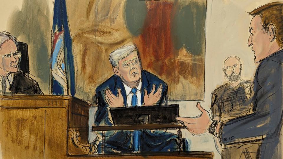 In this courtroom sketch, former President Donald Trump, center, answers questions at the New York Supreme Court on Nov. 6, 2023.