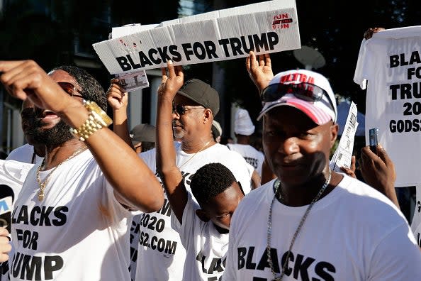 Blacks For Trump supporters stand outside the Wilkie D. Ferguson Jr. United States Federal Courthouse where former President Donald Trump is set to appear in front of a judge (Getty Images)
