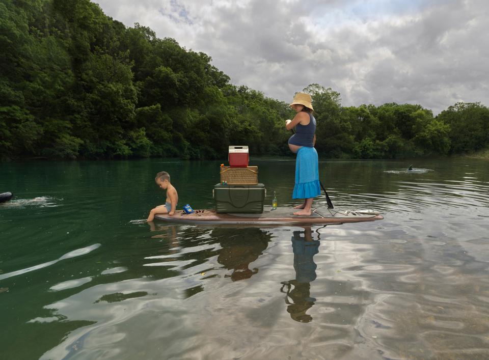 Springfield photographer Julie Blackmon's photograph, "Paddleboard" has been acquired by the National Gallery of Art in Washington D.C. for its permanent collection.