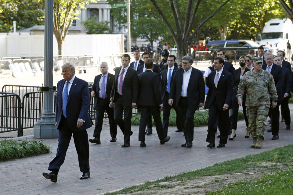 President Donald Trump walks in Lafayette Park to visit outside St. John's Church across from the White House Monday, June 1, 2020, in Washington. Part of the church was set on fire during protests on Sunday night. (AP Photo/Patrick Semansky)